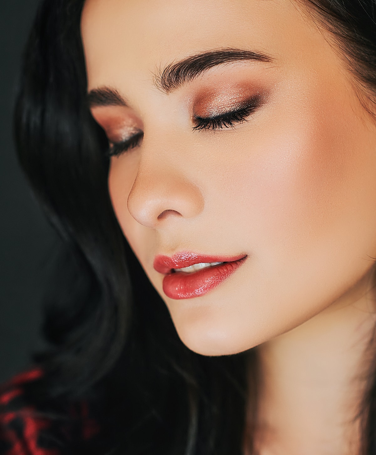 Close-up of woman's face with natural makeup.